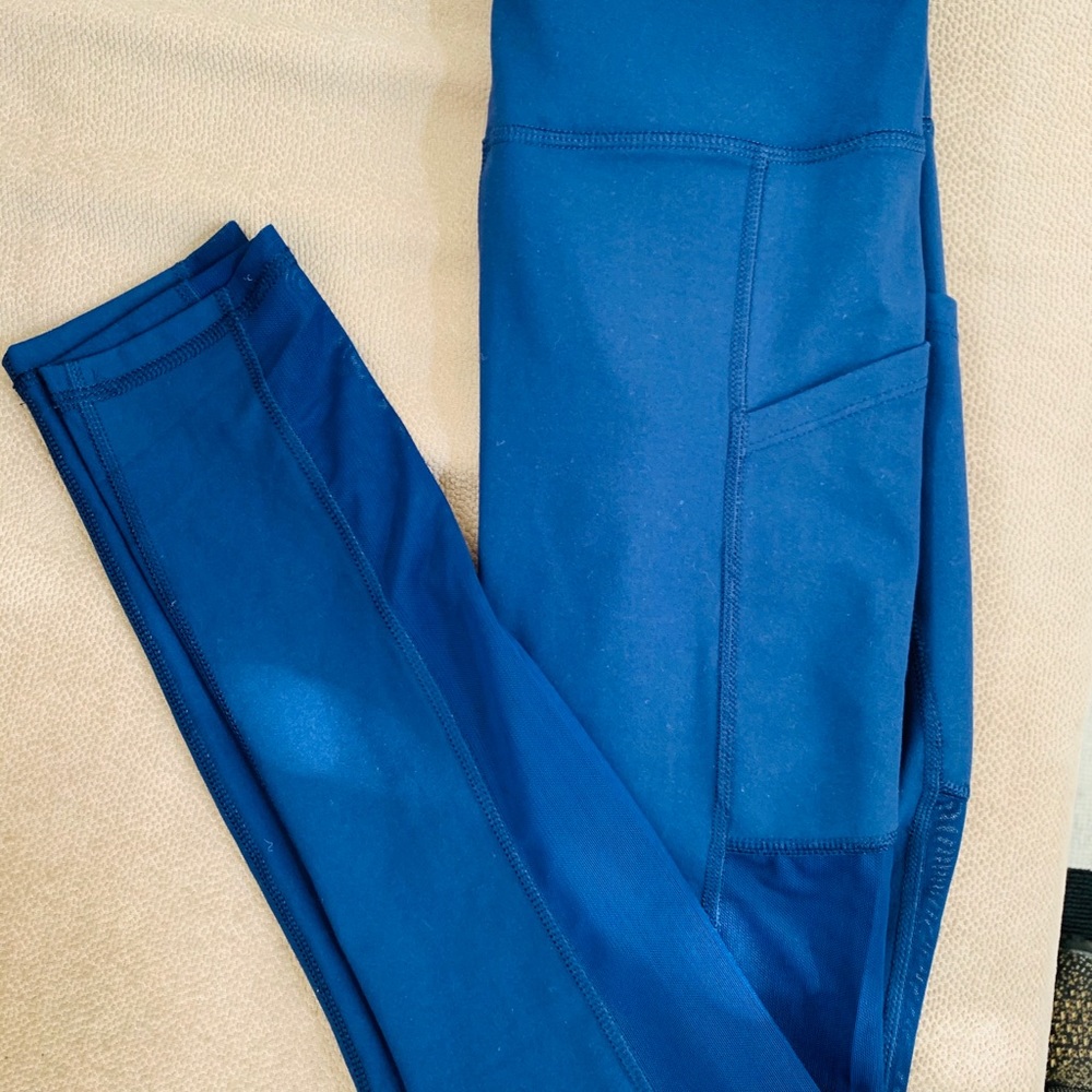 Blue pocket sheer panel workout tights